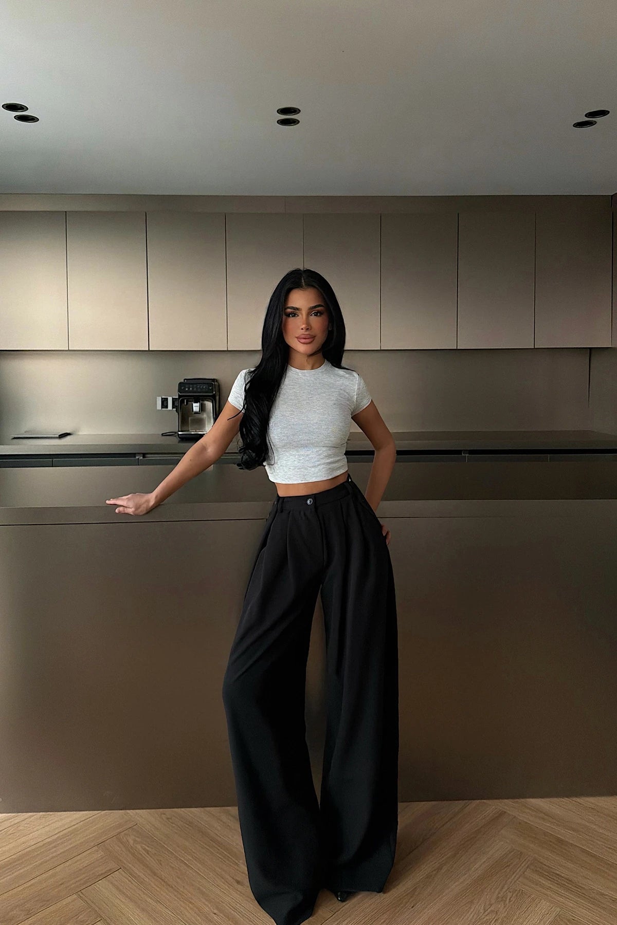 BLACK HIGH-WAISTED TROUSERS