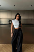 BLACK HIGH-WAISTED TROUSERS