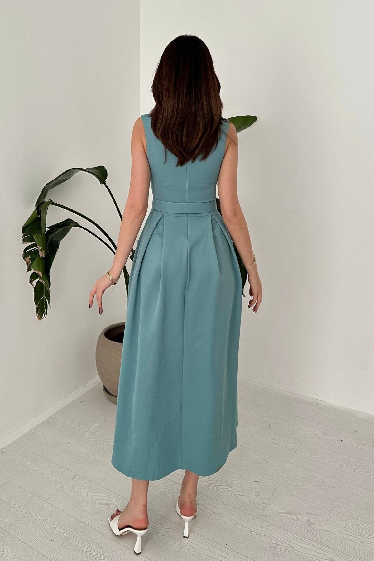 MINT HALTER NECK FLARED MAXI DRESS